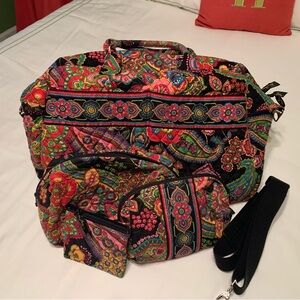 Set of Vera Bradley travel items.